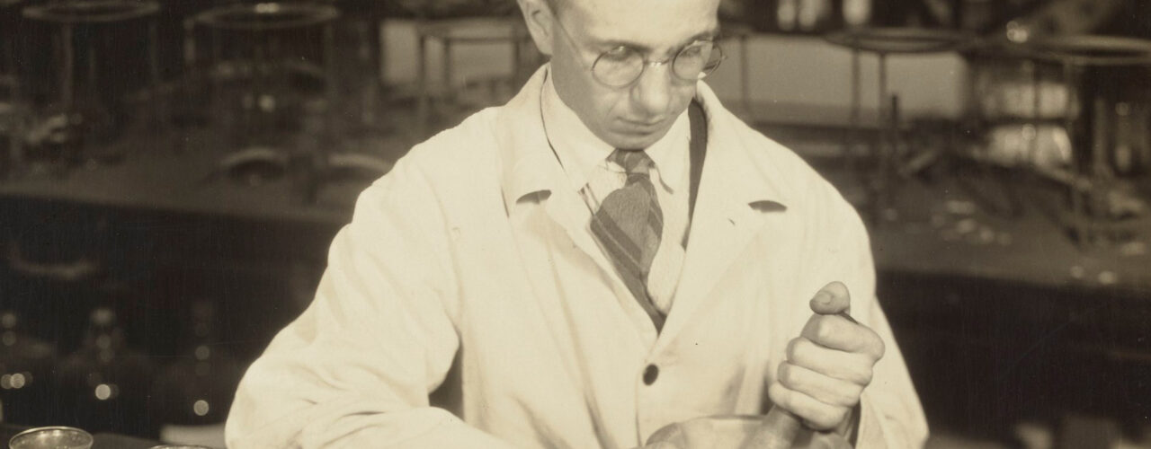 photo of man in a chemistry lab