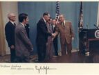 Glenn Seaborg shaking hands with Lyndon B. Johnson