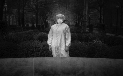 Black and white photograph of nurse Sara Cohen in full PPE.