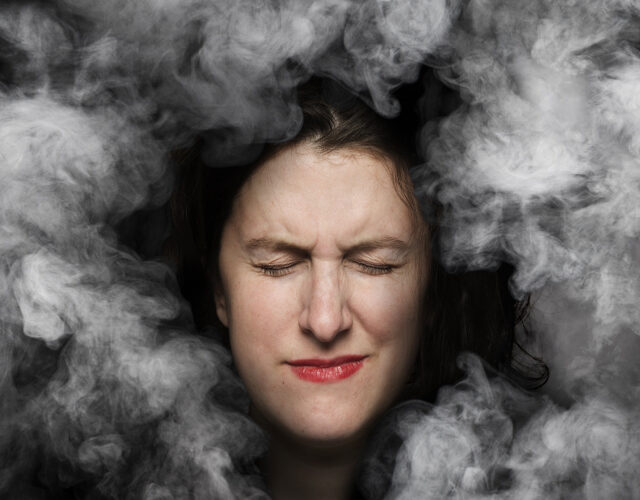 Photo illustration of woman with migraine
