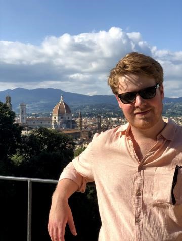 Edward Chappell in front of a view of Florence, Italy