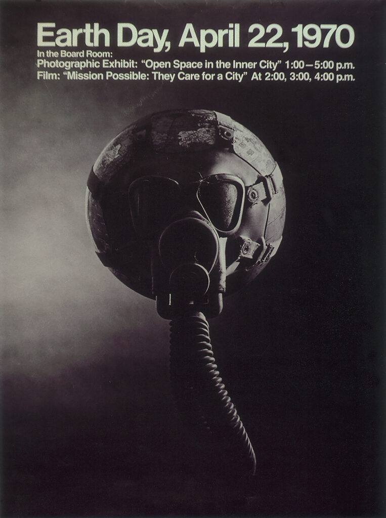 Poster showing an model of Earth with a gas mask attached