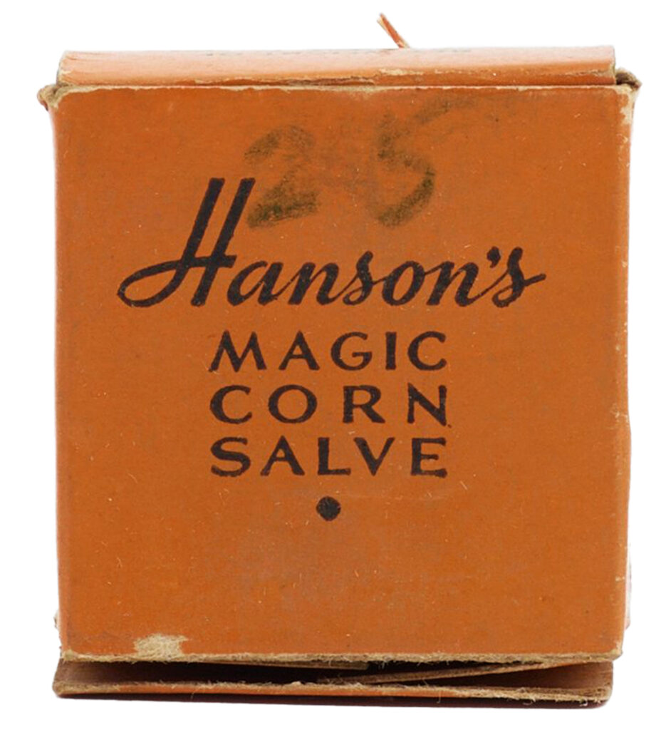 Old orange box holding a patent medicine