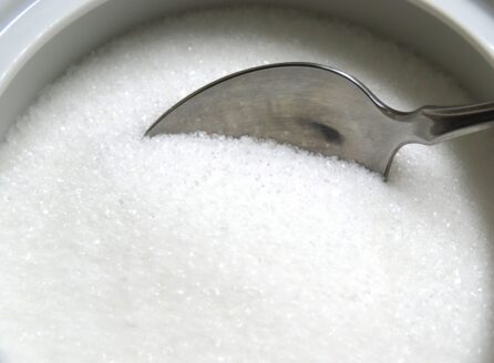 white sugar with a spoon inside