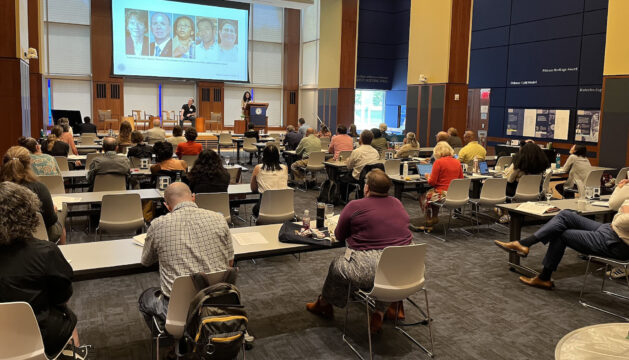 people attending a conference