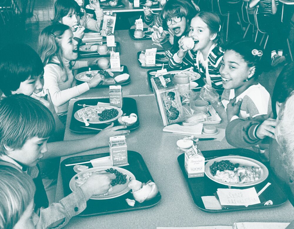 colorized image of students eating lunch