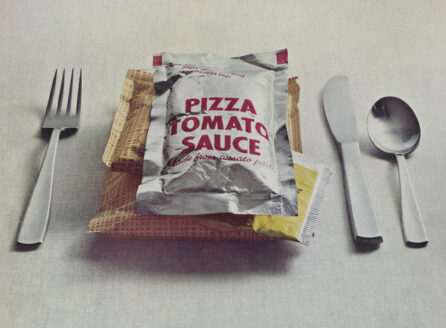 photo of prepackaged pizza with silverware