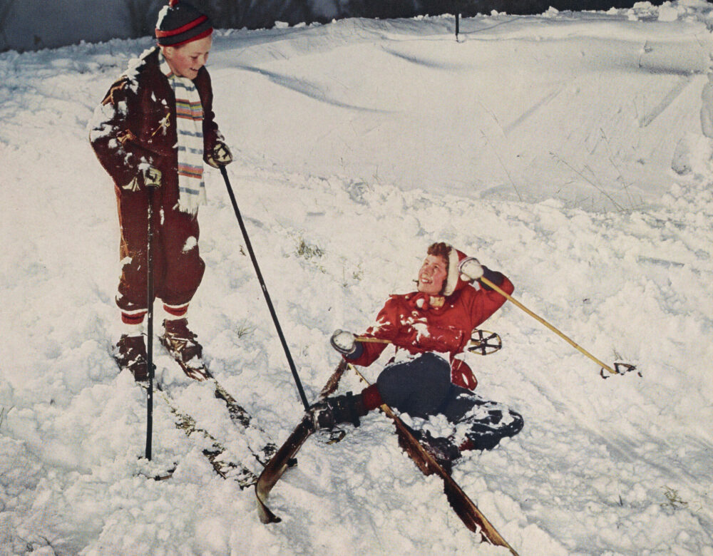 page of magazine with illustration of children skiing