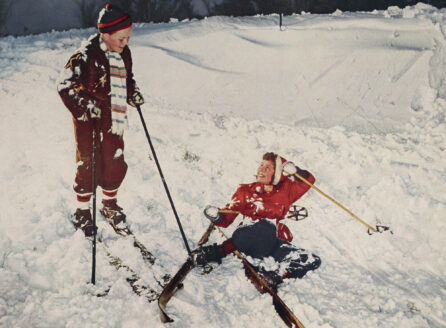 page of magazine with illustration of children skiing