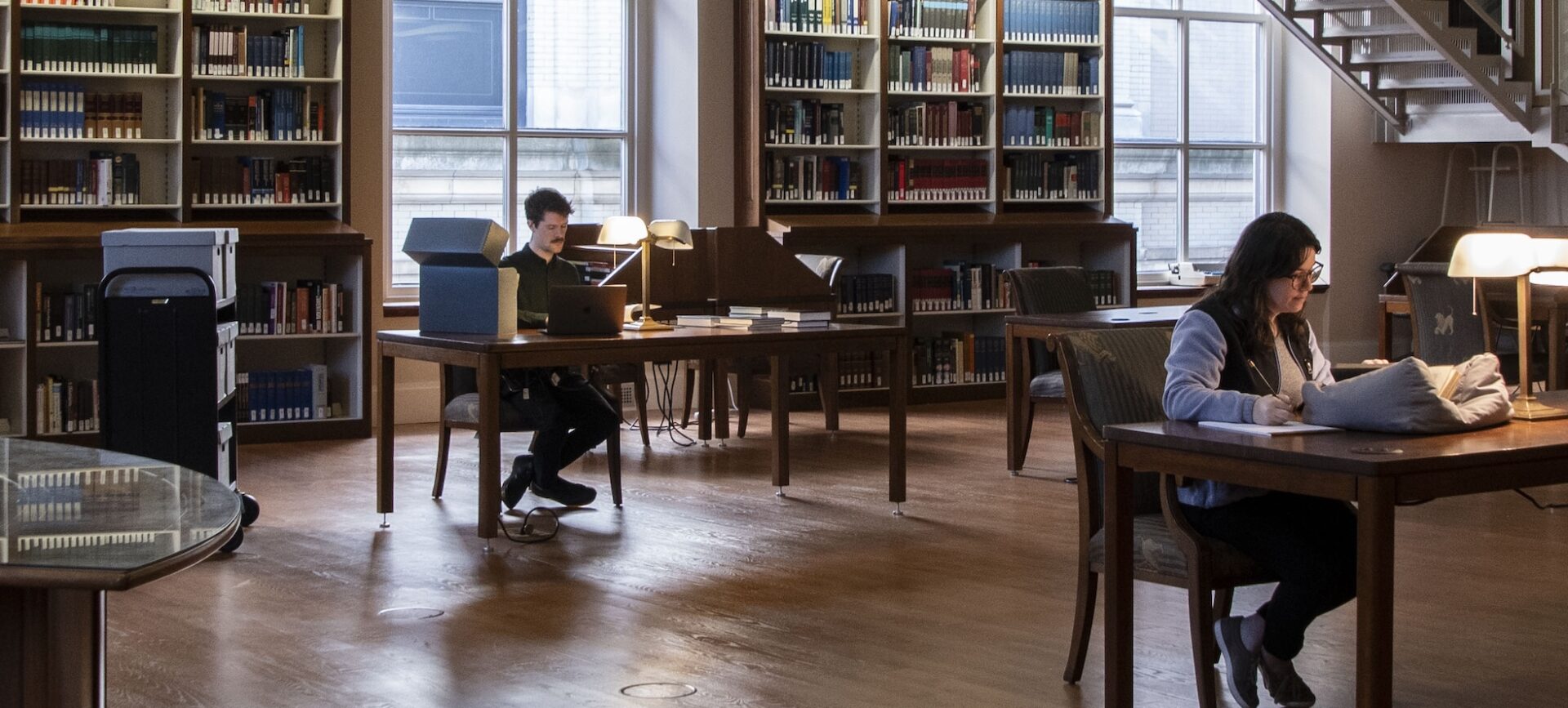 people studying in a library