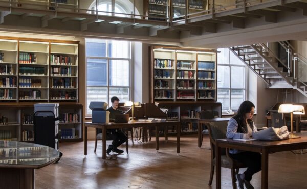 people studying in a library