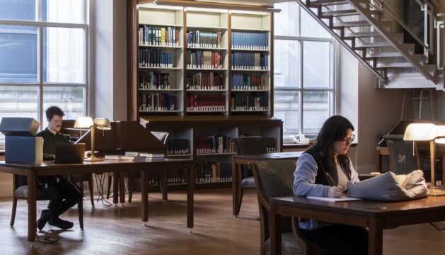 people studying in a library