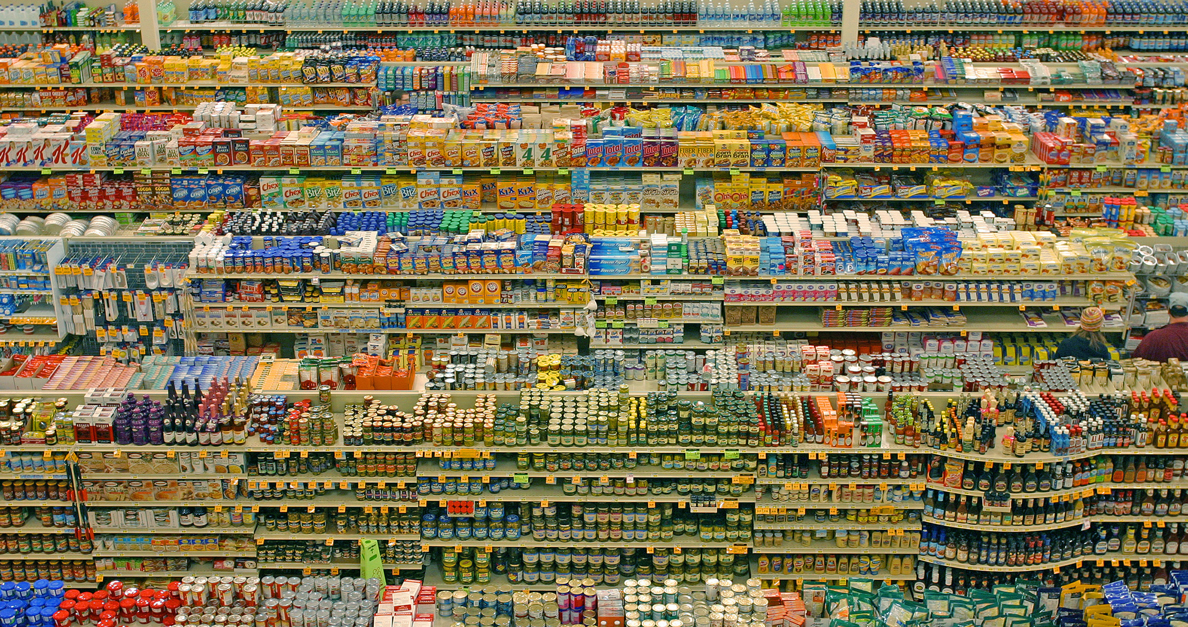 Color photo of supermarket shelves shot from above