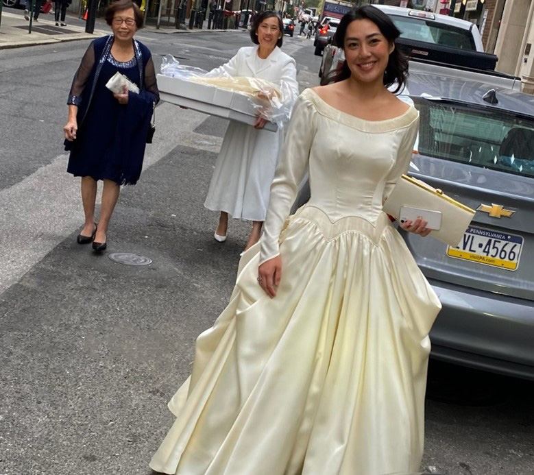 photo of a woman wearing a vintage wedding dress